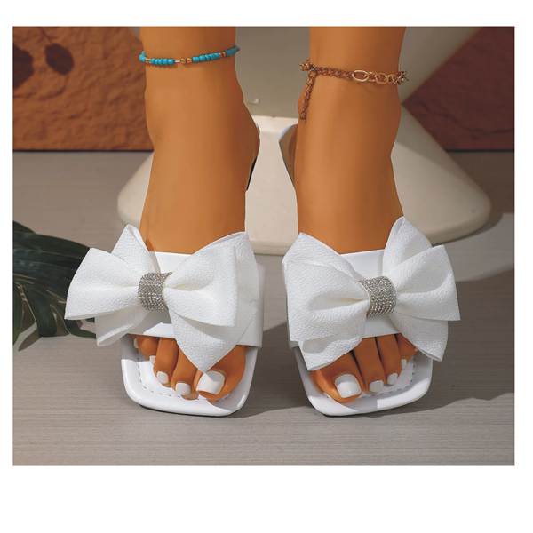 2025 Summer New Women's Bow Design Fashionable and Comfortable Casual Slippers Outdoor Non slip and Wear resistant Flat Sandals